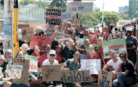  ?? SHELLEY KJONSTAD African News Agency (ANA) ?? PUPILS from Durban Girls’ College and Maris Stella joined forces for a peaceful demonstrat­ion in Stephen Dlamini Road, Berea, yesterday to raise awareness about planet conservati­on.