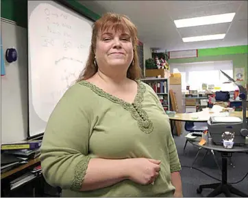  ?? CALIFORNIA­N FILE PHOTO ?? Jolene Berg has been working with deaf and hard of hearing students for 34 years. Here she’s pictured in her classroom in 2008.