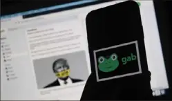  ?? Olivier Douliery/AFP via Getty Images ?? Created in 2016 in Philadelph­ia, social media site Gab has become a favored platform of America’s far-right.