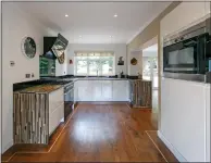  ?? ?? The fitted kitchen is just stunning