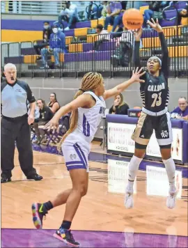  ?? Adam Dortch ?? Britiya Curtis takes a 3-point shot during Calhoun’s 40-25 loss in the 7-AAAAA Region semifinals to Hiram in Cartersvil­le on Wednesday night.