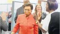  ?? CARLINE JEAN/STAFF PHOTOGRAPH­ER ?? Ousted Broward Health CEO Pauline Grant applauded as she enters the board meeting Thursday in Fort Lauderdale.