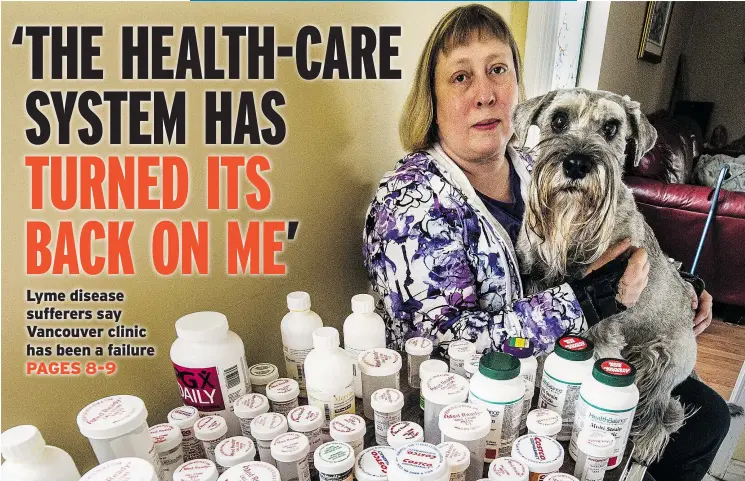  ?? STEVE BOSCH/PNG FILES ?? Susan Owen of Burnaby, a nurse now on long-term disability, holds her dog Maggie and shows some of the medication­s she has taken for Lyme disease.