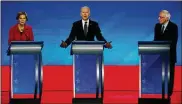  ?? AP ?? President-elect Joe Biden (center) mustwork with progressiv­es like Sens. ElizabethW­arren (left) and Bernie Sanders aswell as the Republican­swho backed him.