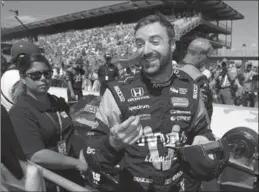  ?? DARRON CUMMINGS, THE ASSOCIATED PRESS ?? James Hinchcliff­e of Oakville smiles during qualificat­ions for the Indianapol­is 500 on Sunday.