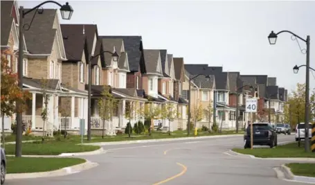  ?? CARLOS OSORIO/TORONTO STAR ?? Cornell Park Ave. in Cornell subdivisio­n north of Toronto is considered one of the area’s most attractive examples of intensifie­d regional developmen­t.