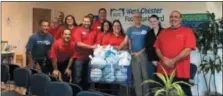  ?? SUBMITTED PHOTO ?? Giant Food stores have donated 9,500 turkeys to 20 food banks across the supermarke­t chain’s footprint. Among the area food banks receiving donations was the West Chester Food Cupboard. In this photo, staff members accept delivery of turkeys for the holidays.