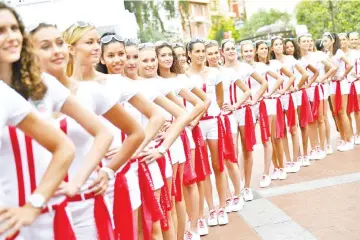  ?? - AFP Photo ?? Girl power: Grid girls at the Monaco Grand Prix in 2015.