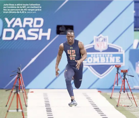  ??  ?? John Ross a attiré toute l’attention au Combine de la NFL en mettant le feu au parcours de 40 verges grâce à un chrono de 4,22 s.