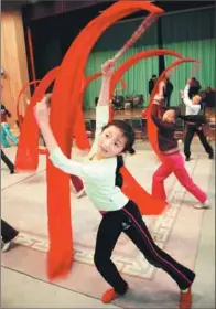  ?? CFP ?? Beijing schoolchil­dren rehearse for their performanc­e in Wellington to celebrate the “sister-city” status of Beijing and Wellington.