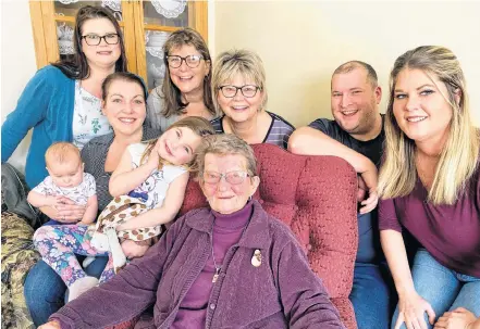  ?? CARLA ALLEN ?? Front row, great-grandchild­ren, Quinn and Paige Hilton with mom/grand-daughter-in-law Jessica Lambert and Florence Goodwin, Staley’s widow. Back, granddaugh­ter Megan Hatfield, daughters Shelley Goodwin, Heather Hatfield, grandson Nick Hilton and granddaugh­ter Keltie Hatfield. Missing: Kim Muise, Andrew Hilton and Crystal Hilton.