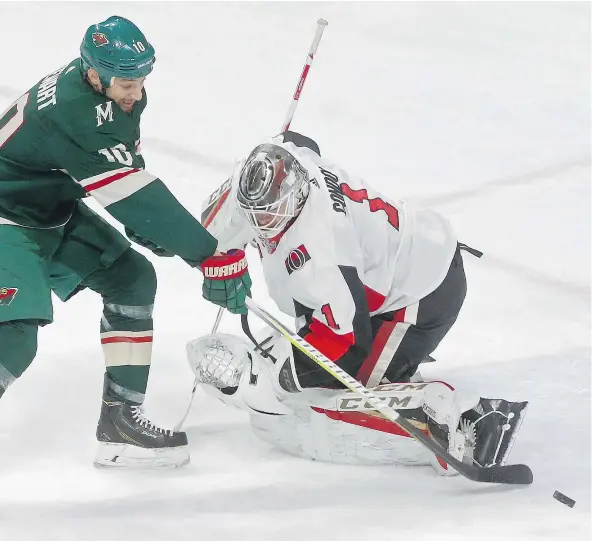  ?? — THE ASSOCIATED PRESS ?? A shot by the Wild’s Chris Stewart goes wide past Ottawa goalie Mike Condon, who played well in his first start since Dec. 30 only to be on the wrong end of a 3-1 decision Monday in St. Paul, Minn.