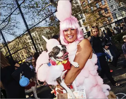  ??  ?? Kiedis and Raquel Torres wear matching cotton-candy costumes.