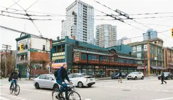  ?? JACKIE DIVES/THE NEW YORK TIMES 2020 ?? Traffic in a section of Vancouver, British Columbia, where immigrants make up a significan­t portion of the population. A new law bans people who are not Canadian from immediatel­y buying residentia­l property.