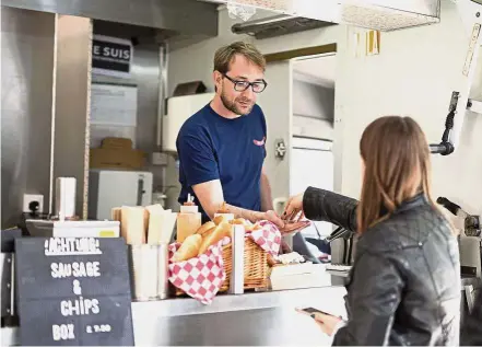  ??  ?? Uncertain: Rising prices, falling profits and doubts about staying in the UK are plaguing Klemt who turned his back on commoditie­s trading for a food truck in the heart of London. - Bloomberg