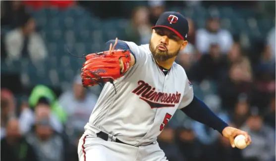  ??  ?? White Sox left- hander Hector Santiago, who pitched for the Twins last season, allowed five hits in two scoreless innings Saturday against the Mariners. | CHARLES REX ARBOGAST/ AP