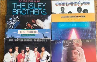  ?? EVAN F. MOORE/SUN-TIMES ?? Vinyl records of The Isley Brothers and Earth, Wind & Fire.