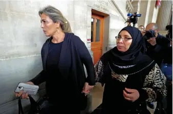  ?? Reuters ?? Zoulikha Aziri, right, mother of Mohamed and Abdelkader Merah, leaves court in Paris