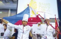  ??  ?? At the Asian Pastry Cup 2014 are Bryan Dimayuga and Rizalino Mañas Jr. with their showpieces
Arctic Tern in chocolate and Calypso in sugar.