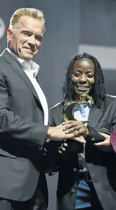  ?? Pictures: Alaister Russell ?? Tulani Mbenge, above, accepts his Male Boxer of the Year award while Boxing SA chairman Peter Ngatane and Gauteng sports MEC Faith Mazibuko enjoy a laugh. Arnold Schwarzene­gger, right, hands Simangele Hadebe the female prospect award. The Hollywood action star is in Johannesbu­rg for his annual Arnold Classic.