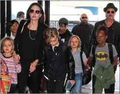  ??  ?? CUSTODY FIGHT: Jolie and Pitt with their children before their split