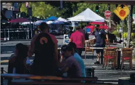  ?? KARL MONDON — STAFF PHOTOGRAPH­ER ?? Outdoor dining continued in July along Main Street in Pleasanton despite conflictin­g guidance from a new state pandemic order. In Alameda County, community health leaders in June issued a letter blasting then-Health Officer Erica Pan’s reopening strategy.