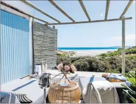  ?? ?? Delightful: A sea-view patio at the Strandlope­r Ocean Boutique Hotel.