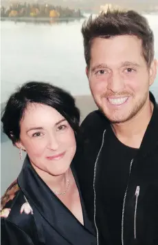  ??  ?? B.C. Women’s Hospital Foundation president-CEO Genesa Greening greeted Michael Buble, who sang when the Glow gala reportedly raised $2.4 million.