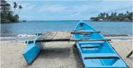  ?? JADA YUAN THE NEW YORK TIMES ?? A fishing boat in southern São Tomé.