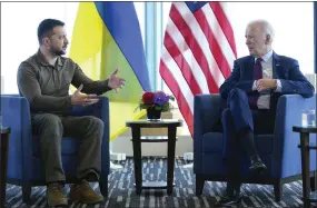  ?? SUSAN WALSH — THE ASSOCIATED PRESS ?? President Joe Biden, right, meets with Ukrainian President Volodymyr Zelenskyy on Sunday on the sidelines of the G7summit in Hiroshima, Japan.