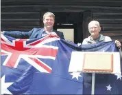  ??  ?? NSW Member for Murray Austin Evans and Henry Matheson OAM unveiling the commemorat­ive plaque at the Log Cabin on Saturday.