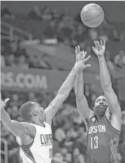  ?? Kelvin Kuo / Associated Press ?? Rockets guard James Harden hits 35.1 percent of his 3-point tries and averages 28.8 points per game.