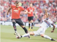  ??  ?? Manchester United’s Andreas Pereira (left) vie with Sampdoria’s Karol Linetty during the pre-season friendly game between Manchester United and Sampdoria at the Aviva stadium in Dublin. — AFP photo