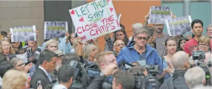  ??  ?? People in Australia protest against resettling refugees in places such as Manus Island.