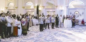  ??  ?? The ballroom of the Trump Internatio­nal Hotel in Washington D.C. where guests gathered.