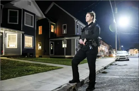  ?? BEN HASTY — MEDIANEWS GROUP ?? Fleetwood police Officer Angela Arndt in the 100block of Locust Street in Fleetwood where in April 2020she kicked in a door of a burning building to help a man to safety. Her actions earned her the Berks FOP Lodge #712021Offi­cer of the Year for her actions.