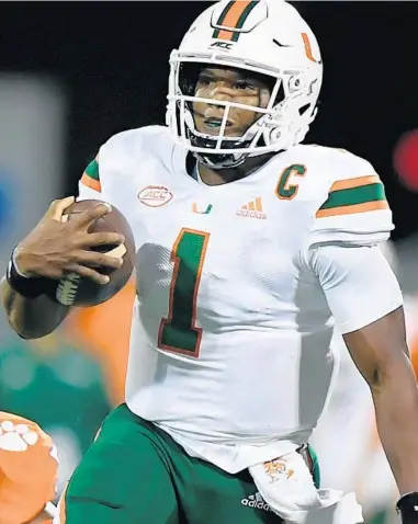  ?? BARTBOATWR­IGHT/THECLEMSON­INSIDER ?? Hurricanes quarterbac­kD’Eriq King had a rough outing againstCle­mson on Saturday.
