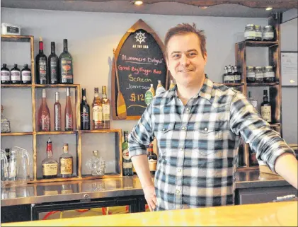  ?? KENN OLIVER/THE TELEGRAM ?? Paul Alexander and his fiancée, Cindy Hann, recently launched The Angry Urchin Kitchen and Bar in Portugal Cove-st. Philip’s, just up the road from the Bell Island ferry dock. The upscale dining establishm­ent offers a food and beverage menu that...