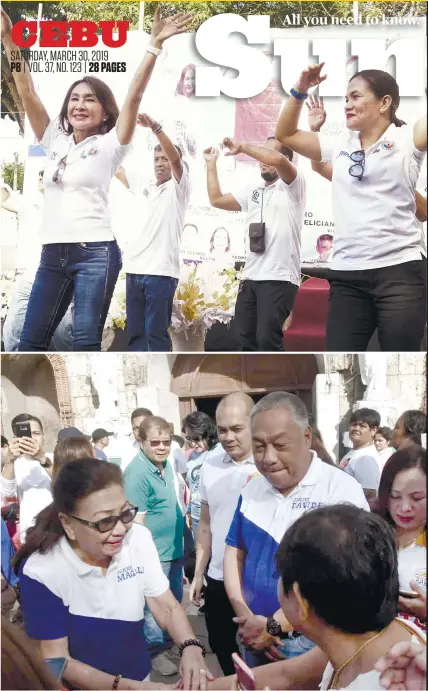  ?? SUNSTAR FOTOS / ALEX BADAYOS (top) and ALLAN CUIZON (above) ?? LET THE GAMES BEGIN. Cebu 3rd District Rep. Gwen Garcia (top photo, left), One Cebu’s president and gubernator­ial bet, dances to the One Cebu campaign jingle with her running mate Daphne Salimbango­n during their caravan in Alcantara town on the first day of the campaign period for local candidates. Also on Friday, March 29, Vice Gov. Agnes Mapale (above), Bakud’s gubernator­ial bet, and her running mate Gov. Hilario Davide III, shook hands with supporters in Danao City. Behind Davide is reelection­ist Cebu 5th District Rep. Ramon “Red” Durano VI. More stories on 6 and 8.