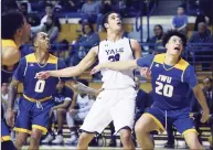  ?? Arnold Gold / Hearst Connecticu­t Media ?? Yale’s Paul Atkinson, center, said via Twitter he was glad the Ivy League canceled winter sports.