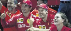  ??  ?? Ferrari men locked out the top steps of the Singapore podium