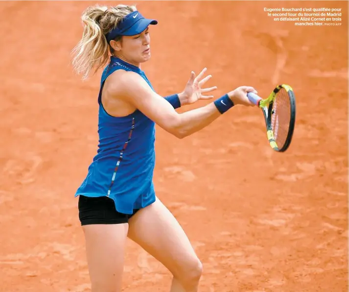  ??  ?? Eugenie Bouchard s’est qualifiée pour le second tour du tournoi de Madrid en défaisant Alizé Cornet en trois manches hier.