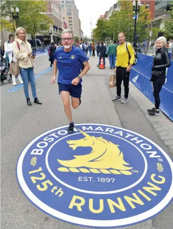  ?? ?? ‘AMAZING FEELING’ Sean Fallon of Simsbury, Conn., ran the virtual Boston Marathon on the race course, a long-time dream of his, on Sunday.