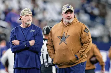  ?? Elias Valverde Ii/dallas Morning News ?? Cowboys head coach Mike Mccarthy, right, isn’t going anywhere after Dallas’ playoff flop against the Packers. But defensive coordinato­r Dan Quinn may be moving on after interviews with Tennessee and Carolina.