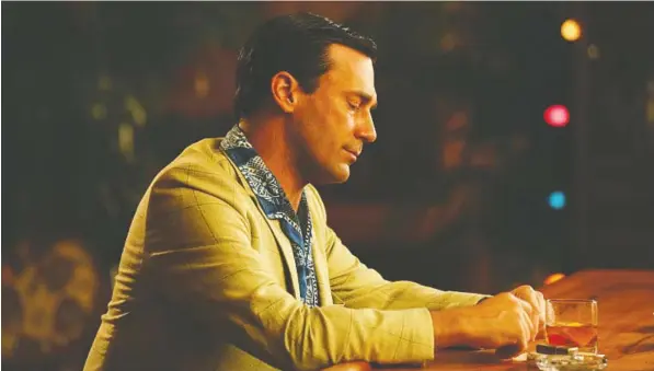  ?? — AMC ?? John Hamm, pictured in Mad Men as Don Draper, takes on a much different role in the new Vancouver-shot indie film Corner Office.
