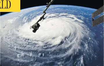  ?? NASAVIAAP ?? Hurricane Florence is seen on Monday from the Internatio­nal Space Station, as it barrels toward the U.S. East Coast.