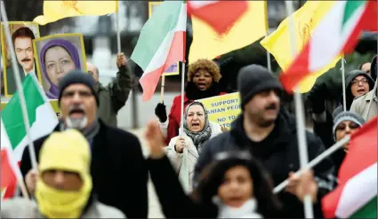  ?? PICTURE: REUTERS ?? Protesters chant slogans against the visit of Iran’s Foreign Minister Mohammad Javad Zarif, outside the EU Council in Brussels, Belgium, this week. EU powers yesterday urged US President Donald Trump to endorse a key nuclear agreement with Iran, saying...