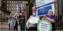  ??  ?? NHS staff staged a demonstrat­ion outside Glasgow Royal Infirmary