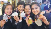  ?? RAJ K RAJ/HT ?? (From left) Tababi Devi, Simran Ahlawat, Mehuli Ghosh and Manu Bhaker at the IOA felicitati­on in New Delhi on Sunday.