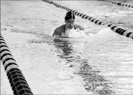  ?? SUZANNE TENNANT/POST-TRIBUNE PHOTOS ?? Lake Central’s Michaela Spears swims the 200-yard individual medley during the Highland Invitation­al on Saturday.